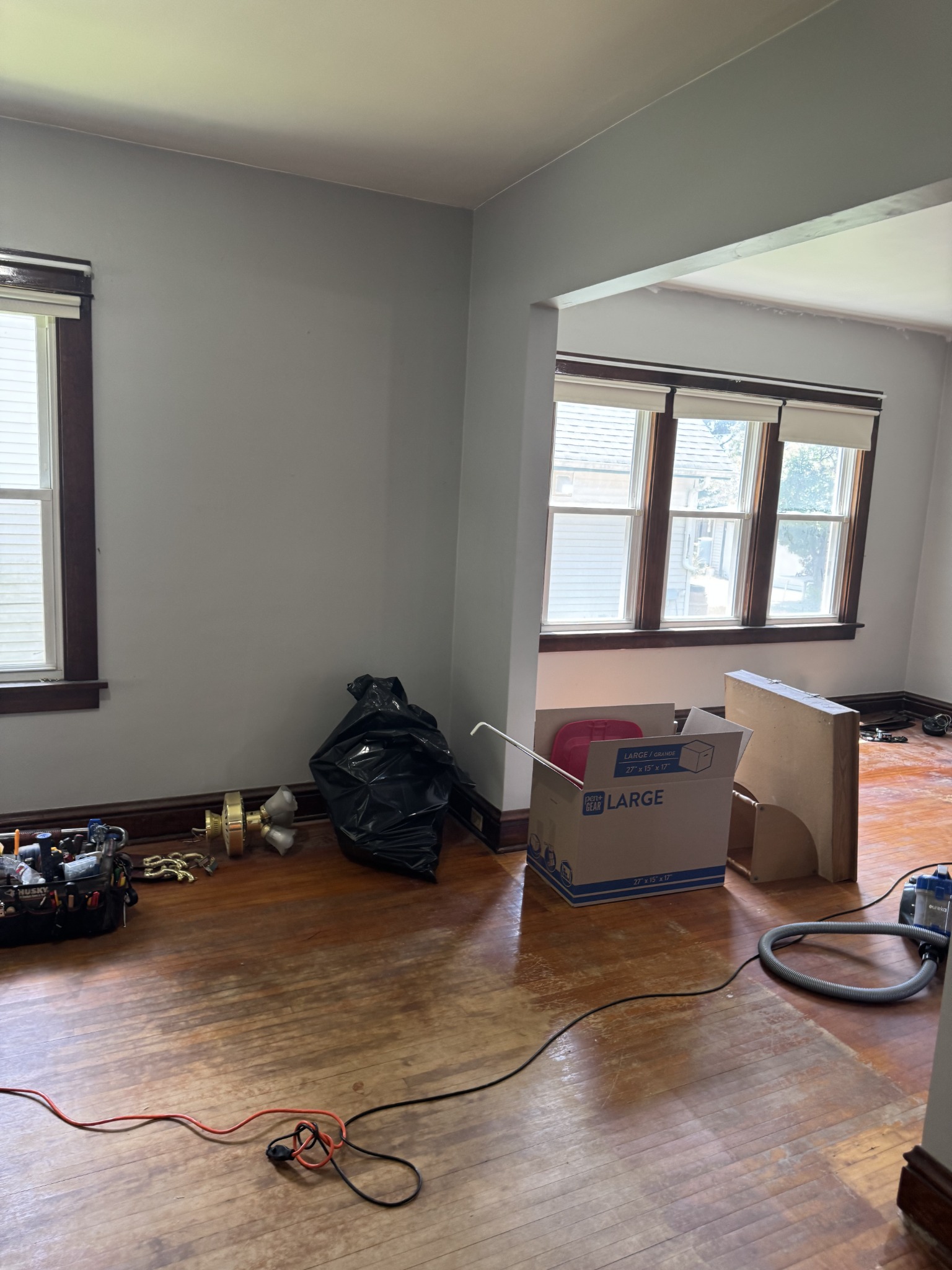 Connecting rooms before painting, viewed toward the dining room